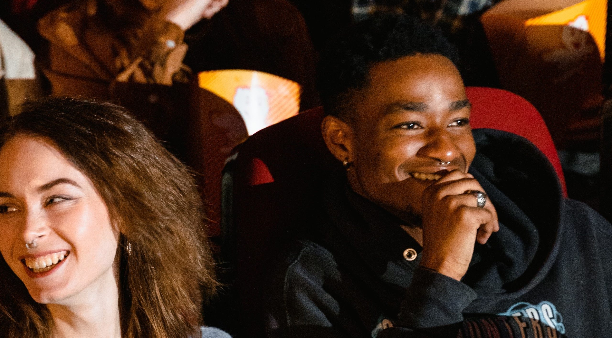 people watching a show laughing. Photo credit by Tima Miroshnichenko, Pexels